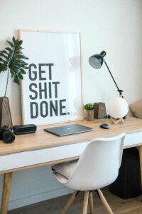 get shit done sign on desk