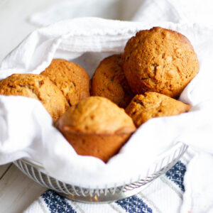 Picture of applesauce muffins in a basket