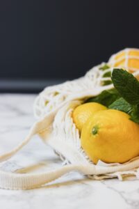lemons in mesh shopping bag