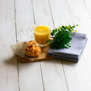 Biscuit egg sandwich with juice