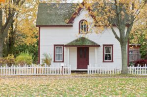 small home with fall leaves