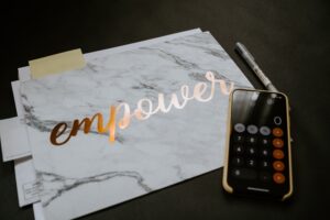 empower and phone with calculator on it