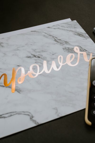 empower and phone with calculator on it