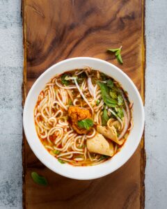 noodles in a bowl is a great way to use meal planning to prevent food waste