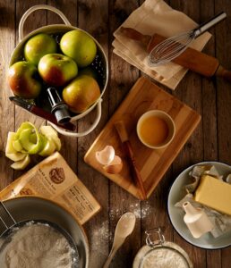 Table with fruit and bowls on it