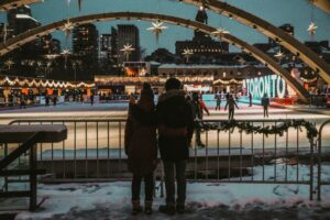 2 people looking at outdoor skating rink