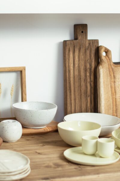 dishes and cutting board on kitchen counter