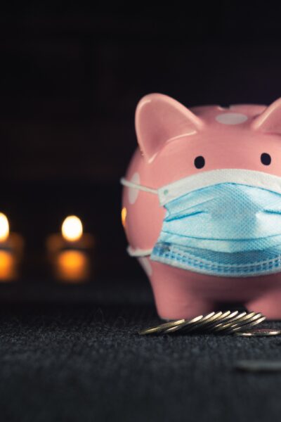 Piggy bank wearing a mask