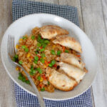 picture of fried rice and potstickers on a plate