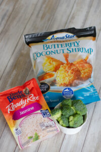 ingredients for air fryer frozen coconut shrimp, broccoli, and white rice.