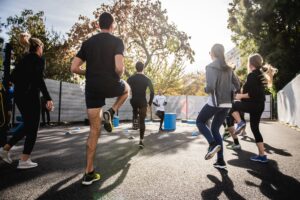 group of people running on path