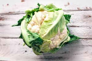 cauliflower fresh picked on wooden table