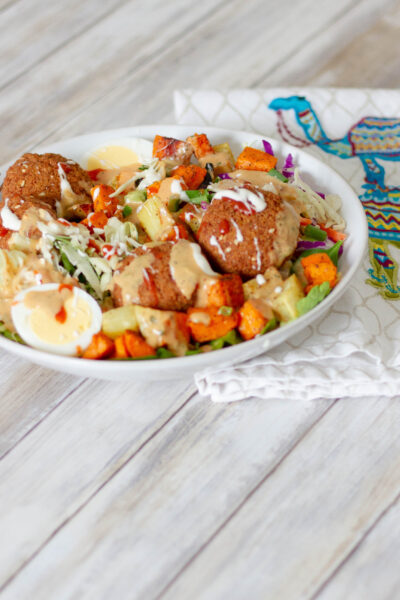 Air Fryer frozen falafel salad in a bowl.