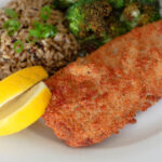 Close up picture of Air fryer fish filet and rice