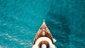 yacht in the teal ocean waters