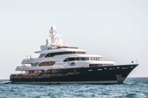 yacht with blue hull on ocean